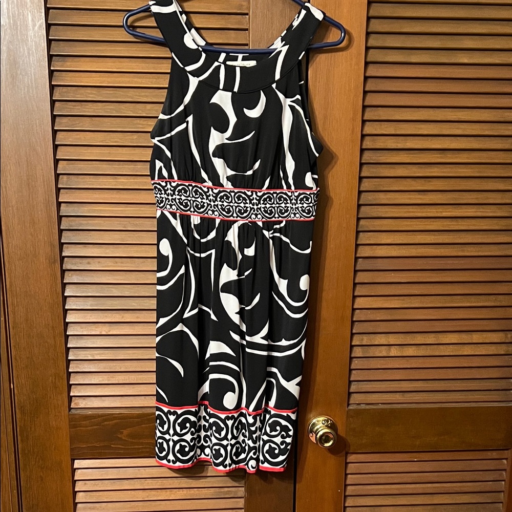 White House Black Market.  Black & White with red trim. Swirl Midi Dress